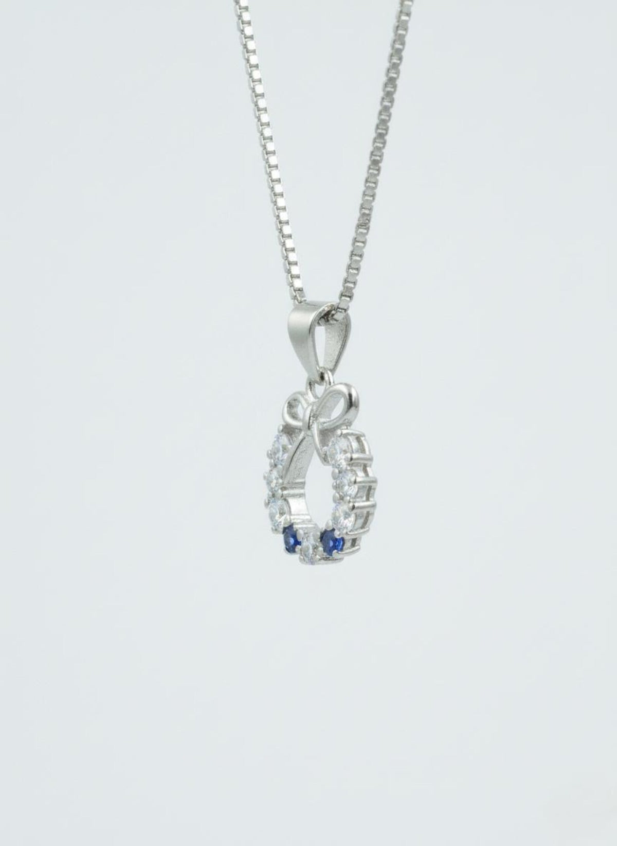 Silvara PDT-5 925 Sterling Silver Bow Circle Pendant with Blue & White Stones | Elegant Gift Design